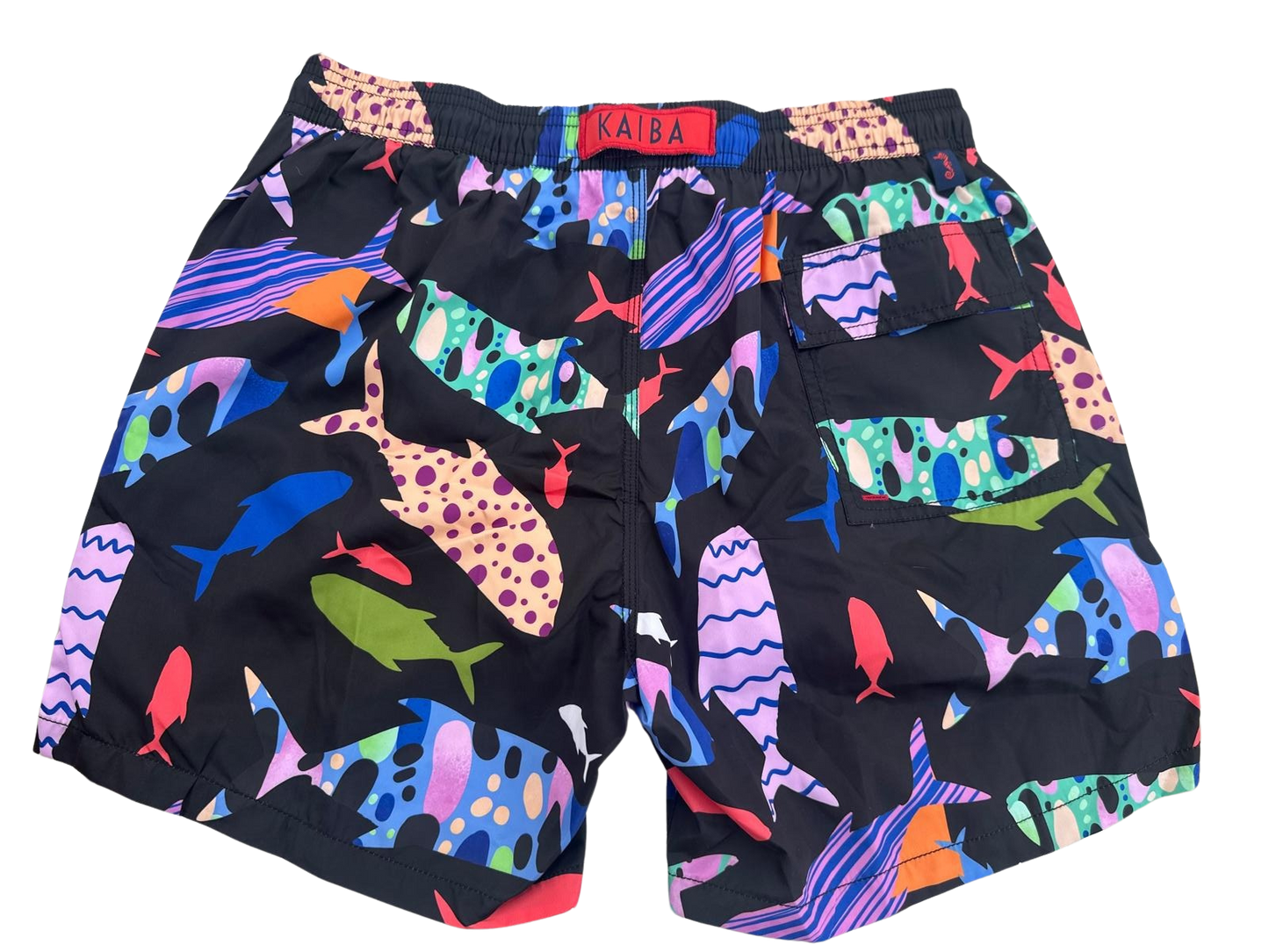 MEN'S FISH PATTERN SWIM SHORTS ON A BLACK BACKGROUND