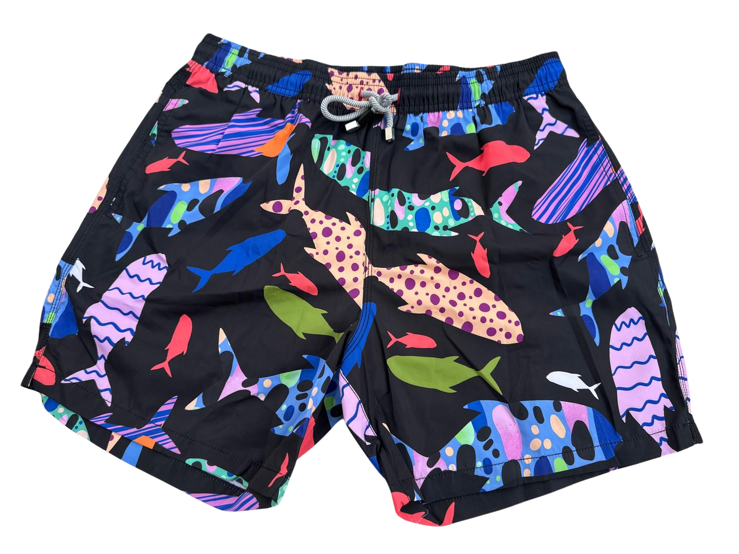 MEN'S FISH PATTERN SWIM SHORTS ON A BLACK BACKGROUND